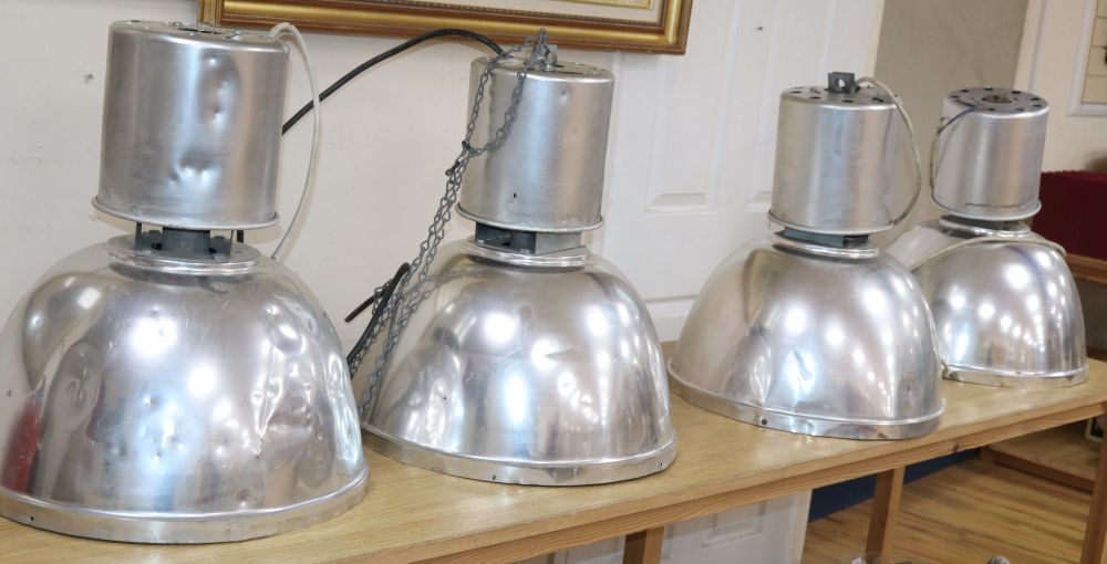 Four large industrial pendant lights, height 56cm
